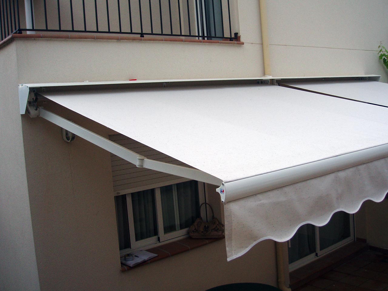 Protective cap for awning